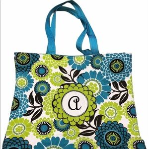 A monogram blue green floral paisley tote bag